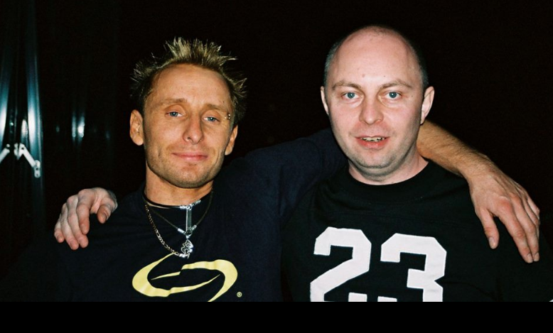 Old photograph of Jason Midro with a friend backstage