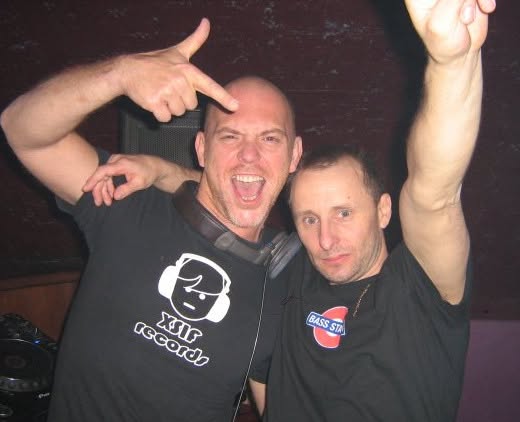Old photograph of Jason Midro with a friend wearing an XSIR Records shirt