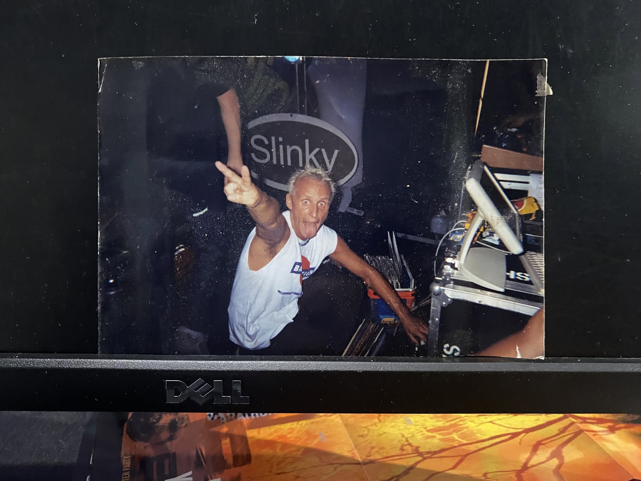 Old photograph of Jason Midro at a Slinky club night, mid-set