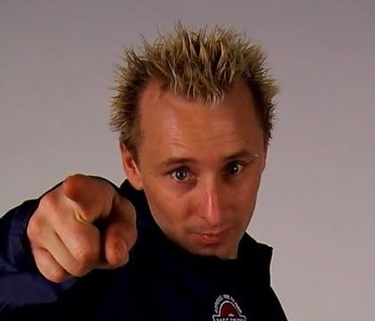 Jason Midro pointing directly at the camera